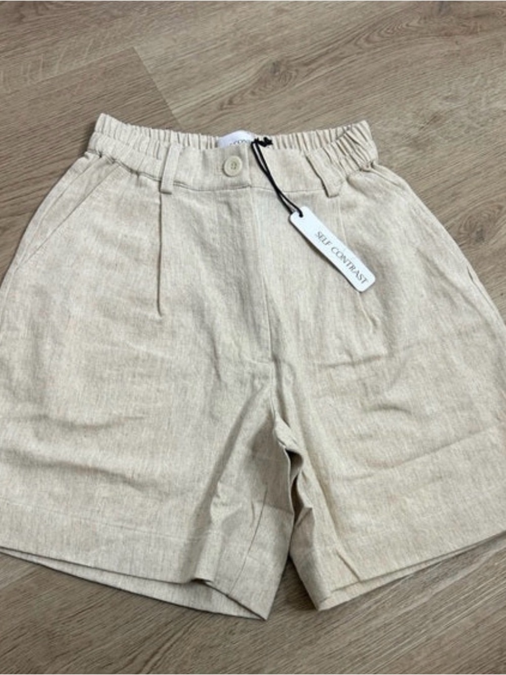 Anthropologie Self-Contrast Linen Cotton High-Waist Shorts in a neutral tan hue